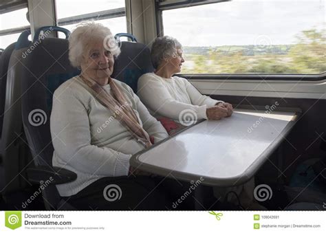 two happy senior woman on a train stock image image of grey woman 109042691