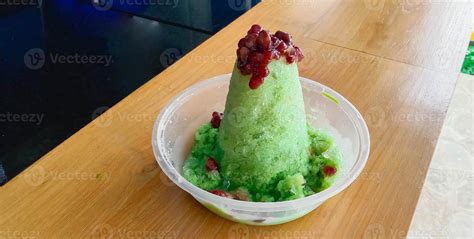 Kakigori Is Japanese Shaved Ice Dessert With Red Beans And Sweet Sauce On Ice Cream