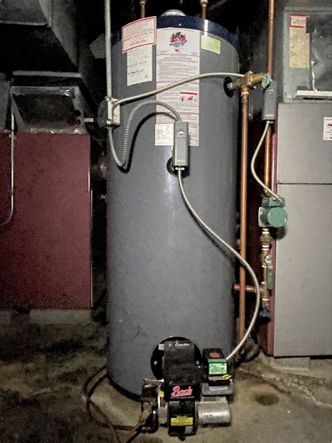 A Bock Gal Oil Fired Hot Water Heater With Taco Pump And Carlin