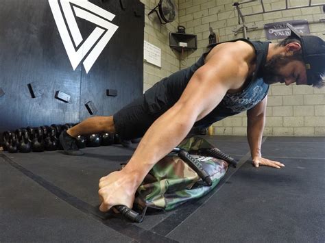 Top 3 Ultimate Sandbag Exercises For Strength And Muscle Ultimate