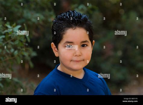 Cute Little Boy In The Woods Stock Photo Alamy