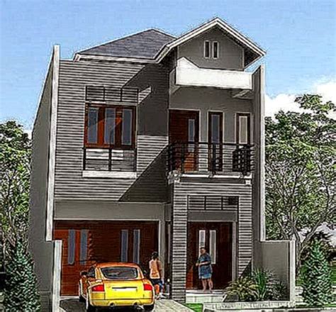 Pagar minimalis yang dibuat dengan menggunakan kayu, menambah kesan hangat dan menenangkan. Gambar Rumah Tingkat Minimalis | Design Rumah Minimalis