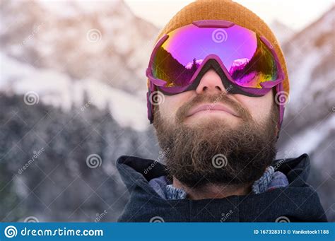 Close Up Portrait Of An Attractive Young Bearded Man In A