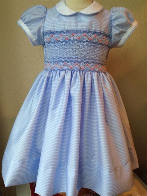 Check spelling or type a new query. Smocking on blue stripe fabric. Very nice! (With images) | Smock dress, Smocked baby dresses ...