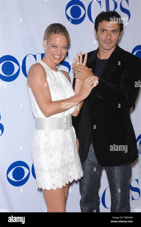 los angeles ca july 20 2007 shark star jeri ryan and husband christophe eme at the cbs summer