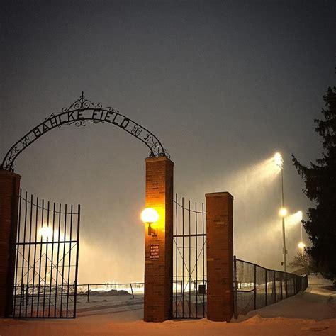 Alma College Bahlke Field Snow At Night Photograph By Chris Brown