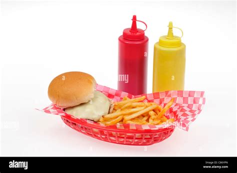 Cheeseburger With French Fries In A Red Plastic Retro Basket With