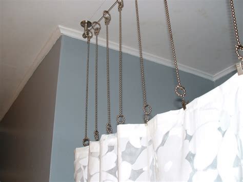 Fake high ceilings by hanging your curtains as high as possible. Types of Ceiling Mount Shower Curtain Rod - HomesFeed