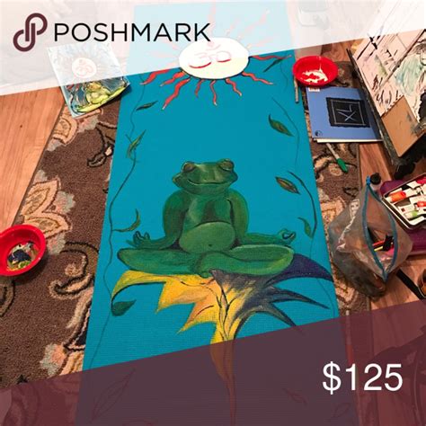 There Is A Rug With A Frog On It And Other Items Around The Room For Sale