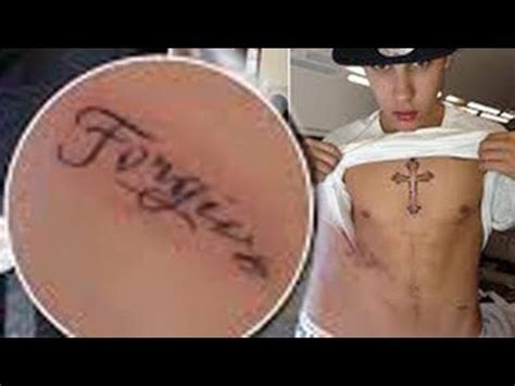 Previous attempts to cover up justin bieber's selena gomez tattoo failed, as the biebs has been spotted still rocking her face on his arm even though he's engaged to hailey baldwin. Justin Bieber Gets New Tattoo 'Forgive': Is It for Selena ...