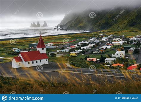 Heavy Clouds Over The Village Of Vik I Myrdal In Iceland Stock Photo
