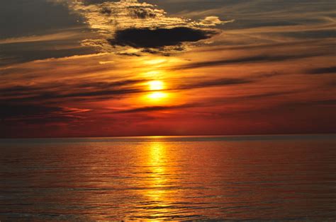 Sunset Over Lake Ontario Peaceful Places Lake Ontario Travel Activities