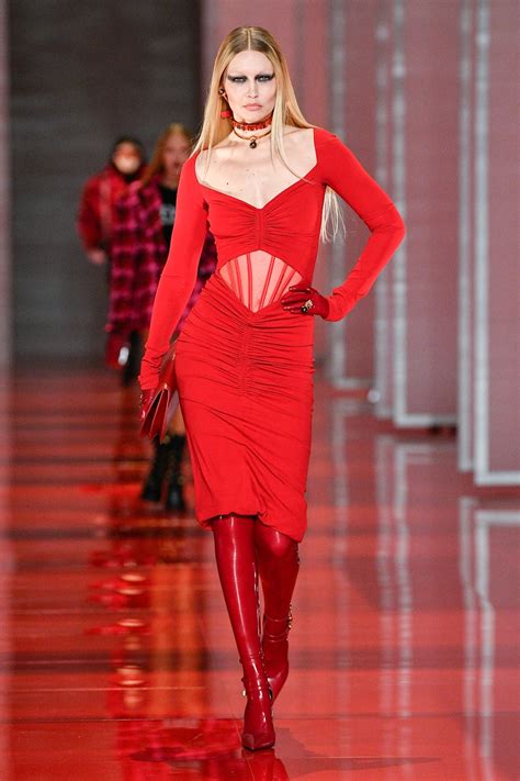 bella and gigi hadid twin in red latex on the versace runway british vogue