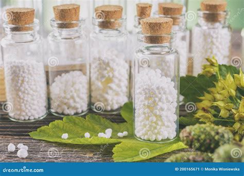 Homeopathic Globules In Glass Bottles Stock Image Image Of Leaf