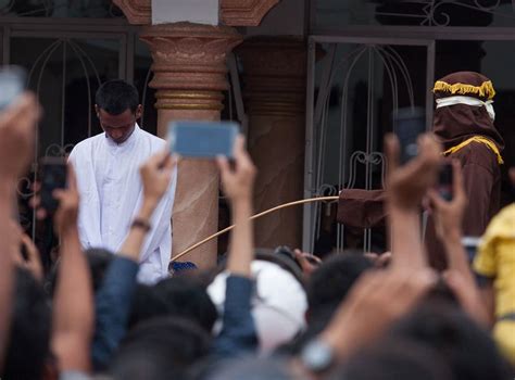 indonesia s aceh province passes law punishing gay sex with public caning the independent