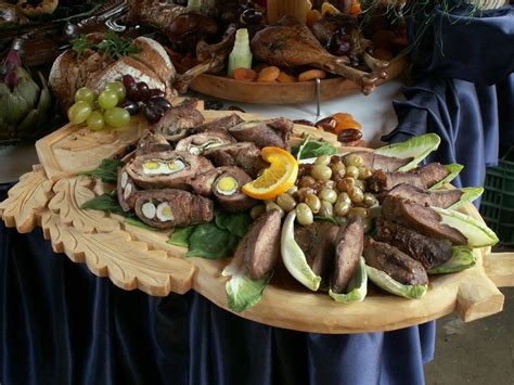 An Assortment Of Meats And Vegetables On A Platter