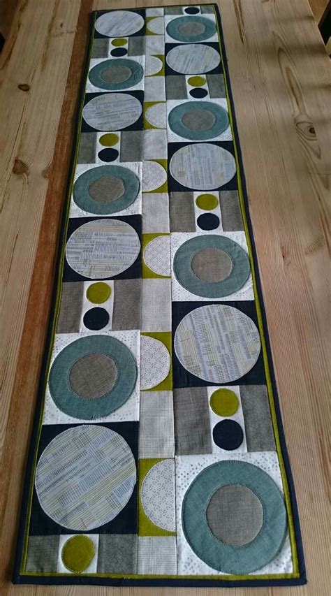 Table runner quilted in trandi blue and white print in cotton fabric. Modern table runner | Modern table runners, Quilted table ...