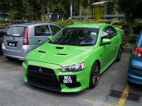 Front bumper extensions, front flares, rear flares, rear door extensions, rear bumper extensions, and all parts and body kits are cad engineered then precision milled using the most advanced technology in the automotive industry. Long's Photo Gallery: Lancer convert Evo X body kit