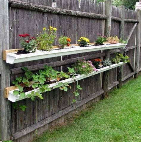 Try These 8 Inventive And Affordable Gutter Garden Ideas Garden And Happy