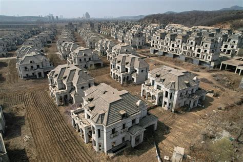 Chinese Ghost Town With Luxury Mansions Occupied By Farmers Breaking