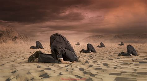 Men Hiding Their Heads In The Sandthis Composite Has Many