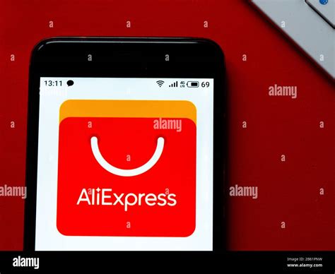 In This Photo Illustration An AliExpress Logo Seen Displayed On A