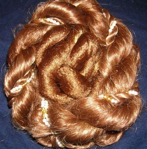 Wearing hair in a bun creates a unique and elegant hairstyle. How to make a fake braided bun hairpiece. one of those ...