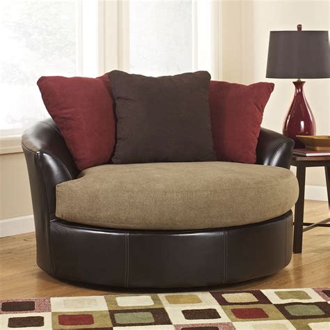 Accent chairs & accent tables. Sanya Mocha Oversized Swivel Accent Chair by Signature ...