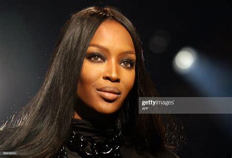 British Supermodel Naomi Campbell Walks Along A Catwalk During A