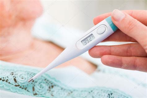 Nurse Checking Body Temperature Stock Photo Lighthunter 104596666