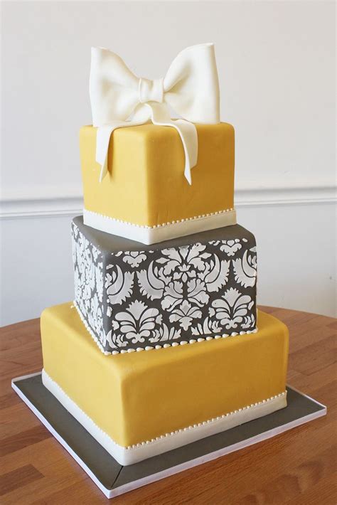 Approximately 25 friends tasted and ranked the cakes to get the so, i have never had such differing personal opinions from the final results. Yellow Damask Off-Set Square Wedding Cake with Bow ...