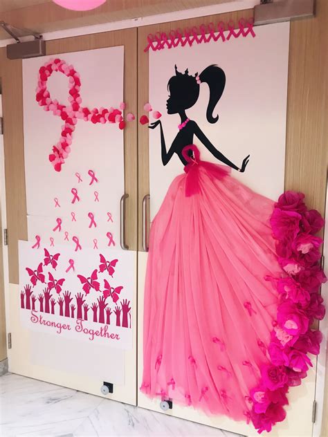 Two Doors Decorated With Pink And Black Paper Flowers One Has A Woman
