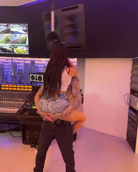 kourtney kardashian straddles travis barker while kissing pics