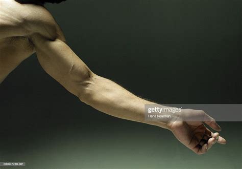 Man Extending Arm Closeup On Arm High Res Stock Photo Getty Images
