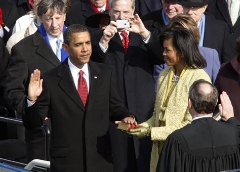 barack obama takes the oath of office as the 44th president of the united states from u s chief