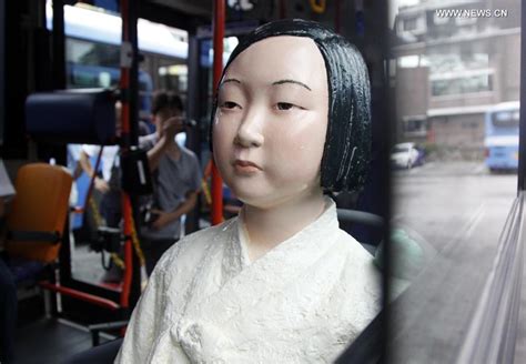 comfort women statues installed on buses in seoul english china youth international