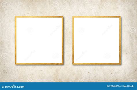 Two White Blanks With Golden Borders Hanging In Textured Vintage Wall