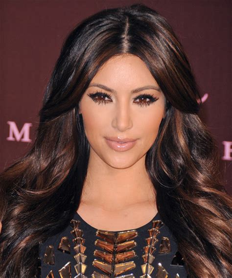 Camille's hair is worn mostly wavy in this shorten length, highlights were added to add depth and dimension to her curls, important to not look too blended for her hairstyle and texture. Kim Kardashian Long Wavy Formal Hairstyle - Dark Auburn ...