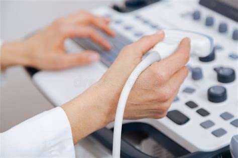 Qualified Medical Specialist Using Ultrasound Equipment In The Clinic
