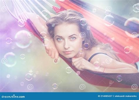 Girl In A Bathing Suit Lying In A Hammock Over The Water Stock Image Image Of Enjoy Summer