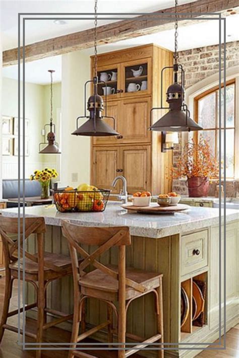 A Kitchen With An Island And Two Hanging Lights Over The Stove Top