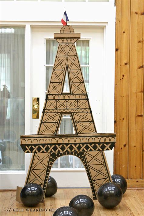 Create a distressed wooden look by. DIY Eiffel Tower (With images) | Paris party decorations, Paris theme party decorations, Paris ...