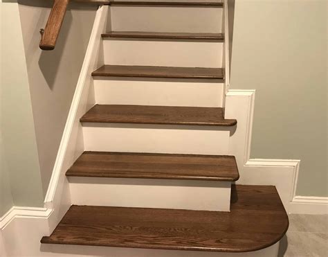 The biggest project was replacing the old carpet on the staircase with hardwood treads and white risers. How to Make Hardwood Stairs Less Slippery (4 Simple Methods) - Prudent Reviews