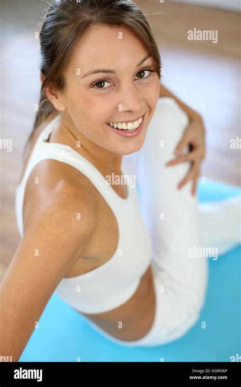 Beautiful Woman Exercising In Gym Stock Photo Alamy