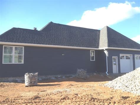 The energy efficiency / heat stabilizing characteristics of stone can contribute to reducing heating and. Mastic Solar Defense Siding - Traditional - Baltimore - by ...