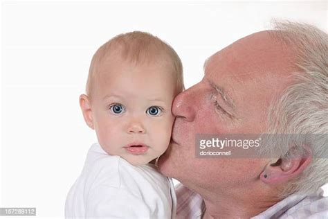 Dad Kissing Baby Skin Photos And Premium High Res Pictures Getty Images