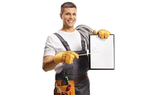 Repairman With A Tool Belt Pointing At A Clipboard Stock Photo Image