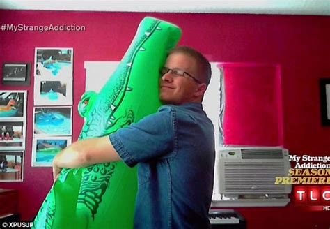 the man who is in love with inflatables and says he would marry his favourite a dragon named