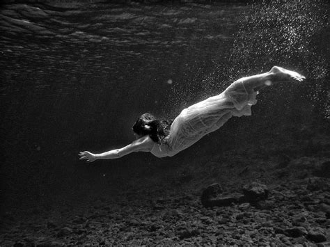 Girl With Clothes Underwater Photograph By Manolis Tsantakis Pixels