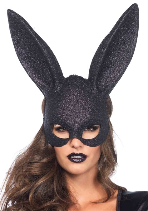 This mask is fitted with adjustable ear loops for ultimate comfort and is made with both fashion and function in mind! Black Glitter Bunny Mask